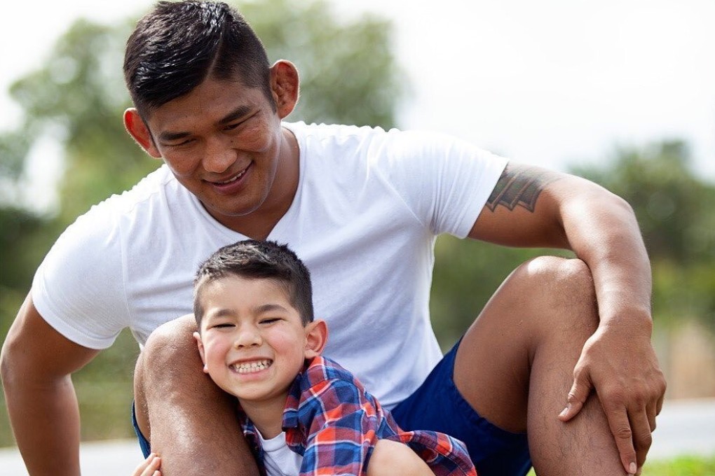 Aung La N Sang poses with his son. The One Championship middleweight champion’s defence against Vitaly Bigdash is in limbo amid the coronavirus pandemic. Photo: Instagram