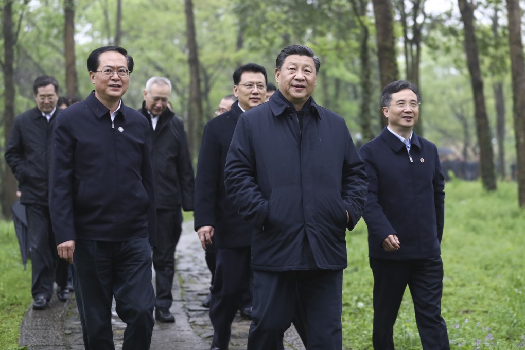 Xi Jinping and other senior officials pictured without masks during a tour of Zhejiang province. Photo: Xinhua