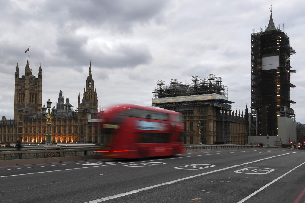 A bus drives along an otherwise deserted Westminster Bridge in London, where about 180 students from China are preparing to return home on a special flight organised by the Chinese government. Photo: AP