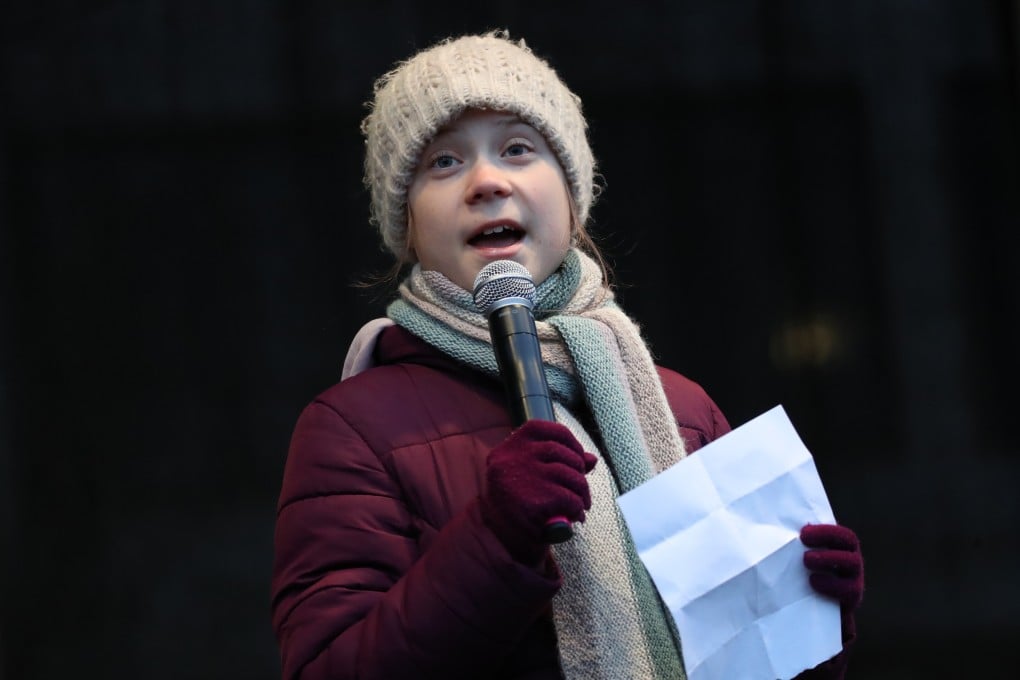 Swedish climate activist Greta Thunberg has urged climate campaigners to avoid mass protests and rather post photos of themselves holding placards online. But two Singaporeans who did this have fallen foul of the city state’s strict anti-protest laws. Photo: DPA