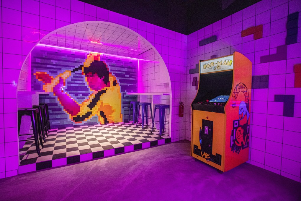 A pixelated mural of kung fu legend Bruce Lee on the wall of Nineteen80 bar in Singapore. The bar pays homage to all things retro. Photo: Nineteen80