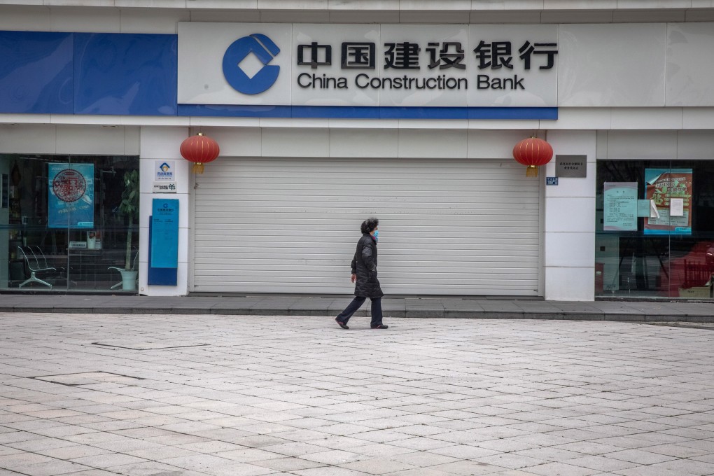 A closed China Construction Bank branch in Wuhan. The lender says about 5 per cent of its small and medium-size business borrowers had requested an extension of loan repayments. Photo: EPA-EFE