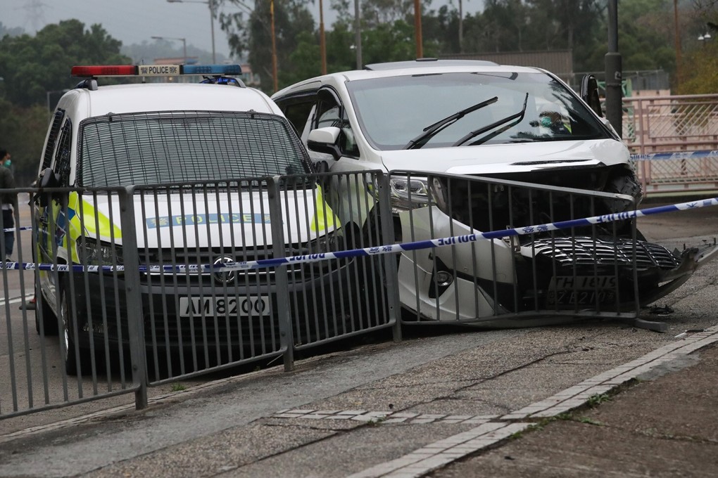 The vehicle crashed into roadside railings. Photo: Edmond So