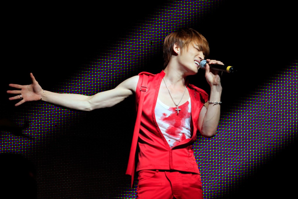 Kim Jae-joong of South Korean pop group JYJ performs during their concert in Lima, Peru, in March 2012. Photo: Reuters