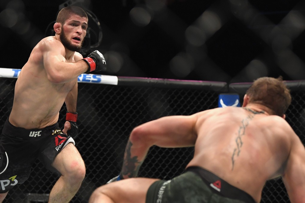 Khabib Nurmagomedov chases down Conor McGregor in their UFC lightweight championship bout at UFC 229. Photo: AFP