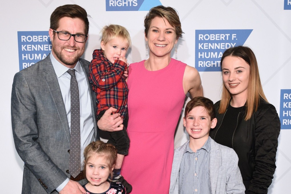 David McKean, Maeve Kennedy Townsend Mckean and their children (son Gideon 2R). Photo: AFP
