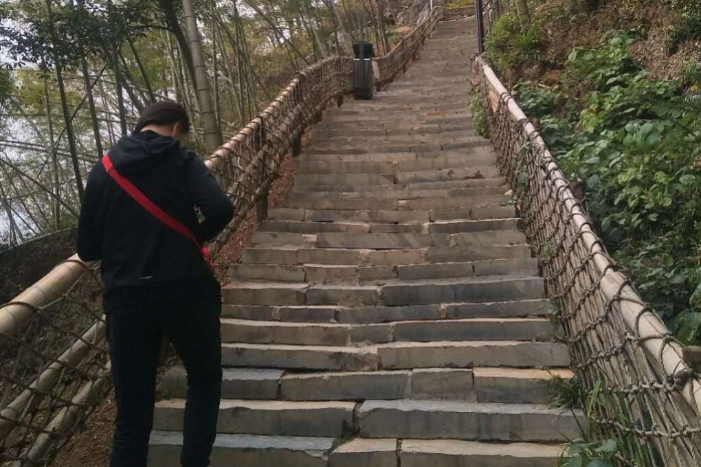 Li Yue, pictured, has some way to go after contracting, then recovering from coronavirus. Both Li, 42, and her husband Lu Ming, 45, were infected in their home city of Wuhan in Hubei province. Photo: Handout