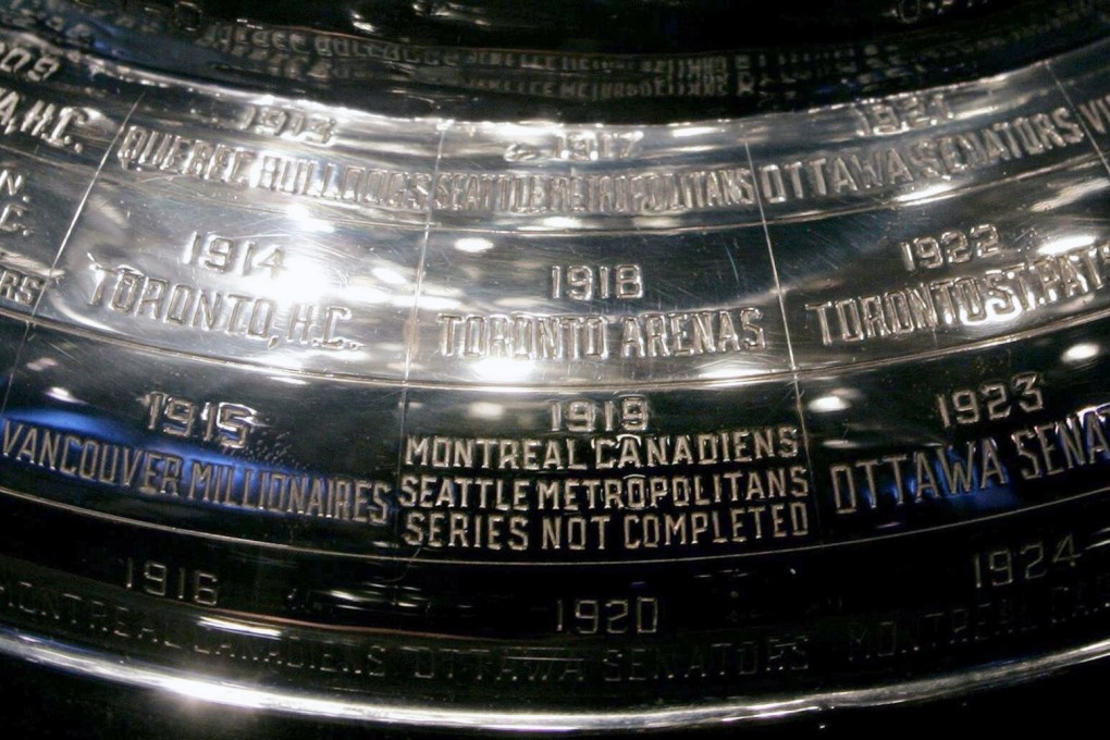 The inscription on the Stanley Cup showing the 1919 series not completed, displayed at the Hockey Hall of Fame in Toronto. Photo: AP
