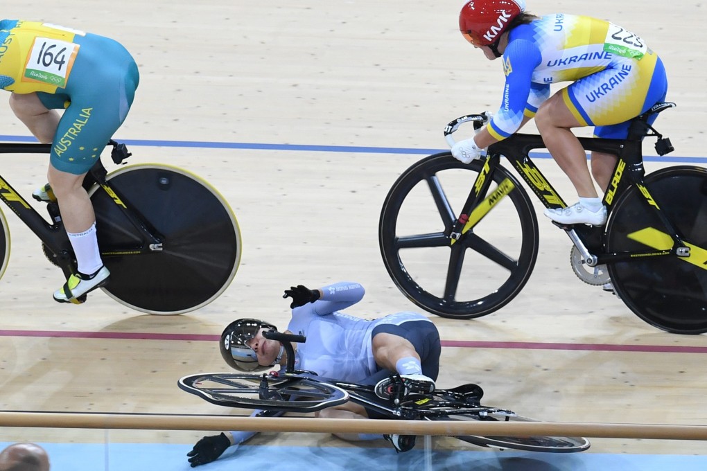 Sarah Lee is seen crashing out in the backbend after a clash with Anna Meares (no 164) of Australia during the second round of the keirin at the 2016 Rio Olympics. Photo: EPA