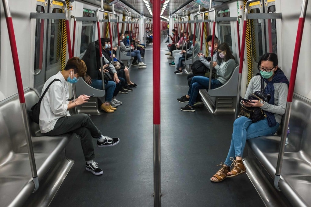 Masks all around on board an MTR train in Hong Kong on April 4. Photo: AFP