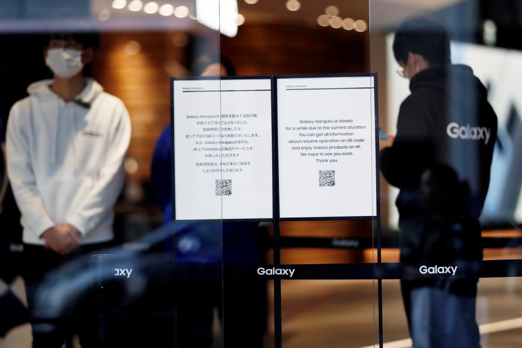 'Closed' notices are displayed at the entrance of Galaxy Harajuku, a flagship store of the Galaxy brand mobile computing devices by Samsung Electronics, during the coronavirus disease outbreak, in Tokyo, Japan March 26, 2020. File photo: Reuters