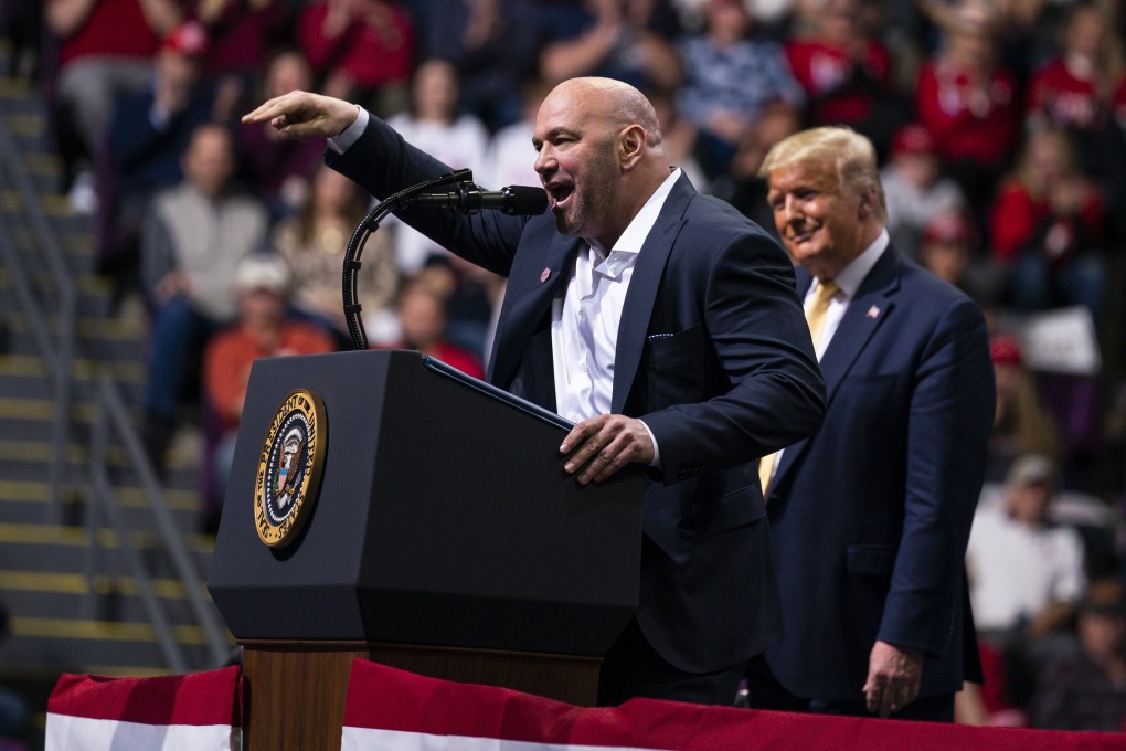 President Donald Trump looks on as UFC president Dana White speaks during a campaign rally in Colorado Springs. Photo: AP