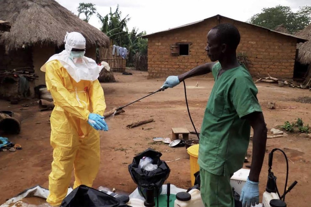 A health worker prepares to degown in Sierra Leone. Photo: Handout