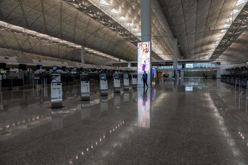 Deserted check-in counters at Hong Kong International Airport. Photo: AFP