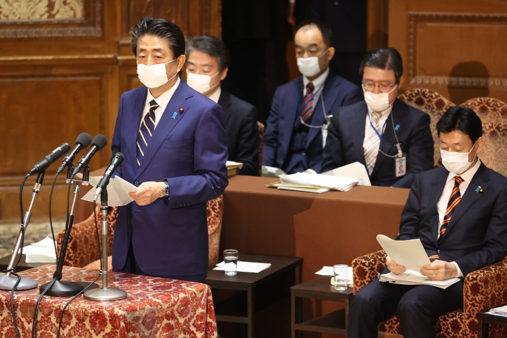 Japan’s Prime Minister Shinzo Abe (front L) declared a state of emergency due to the coronavirus pandemic. Photo: AFP