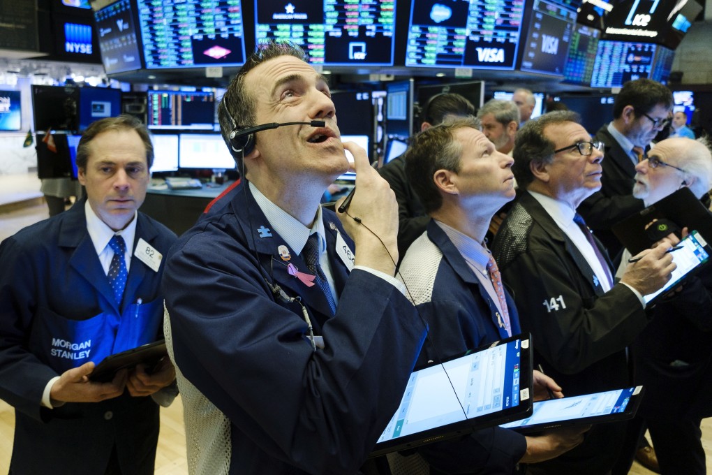 Floor traders at the New York Stock Exchange on 4 March 2020. Photo: EPA-EFE