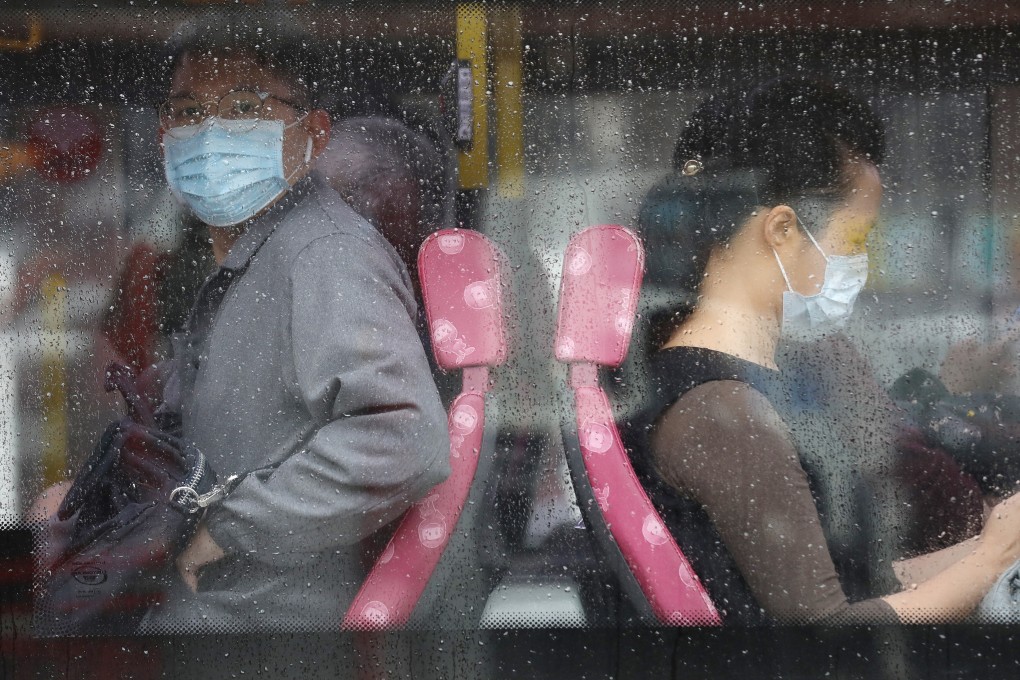Commuters in face masks in Hong Kong. Photo: Winson Wong