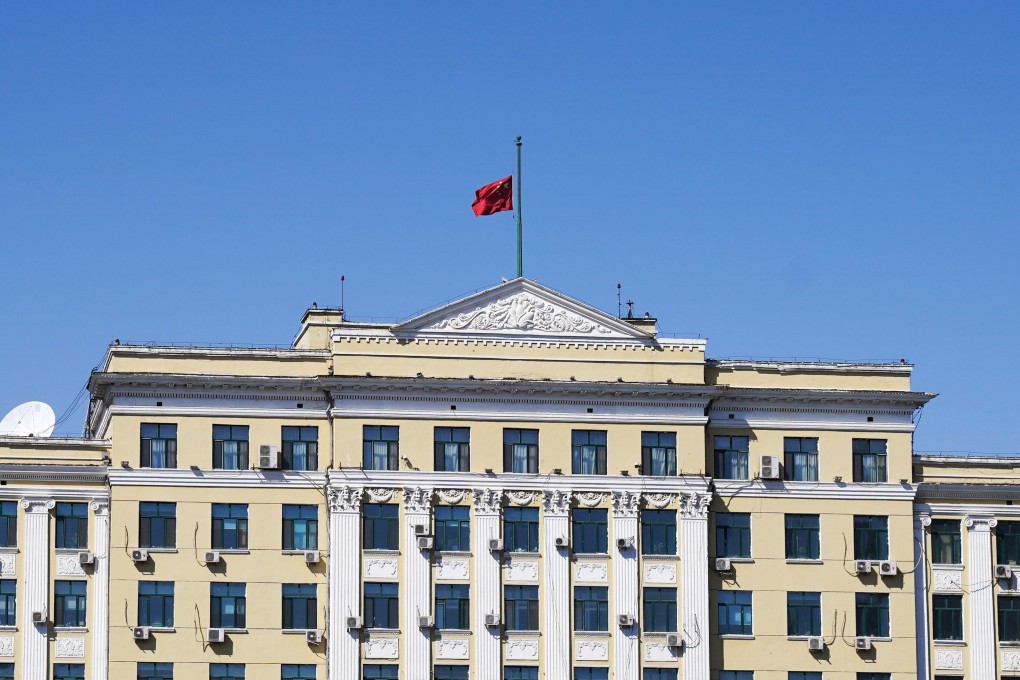 The Chinese national flag flies at half-mast in Harbin, capital of Heilongjiang province, to honour those who have died in the fight against the novel coronavirus. Heilongjiang shares a border with Russia. Photo: Xinhua