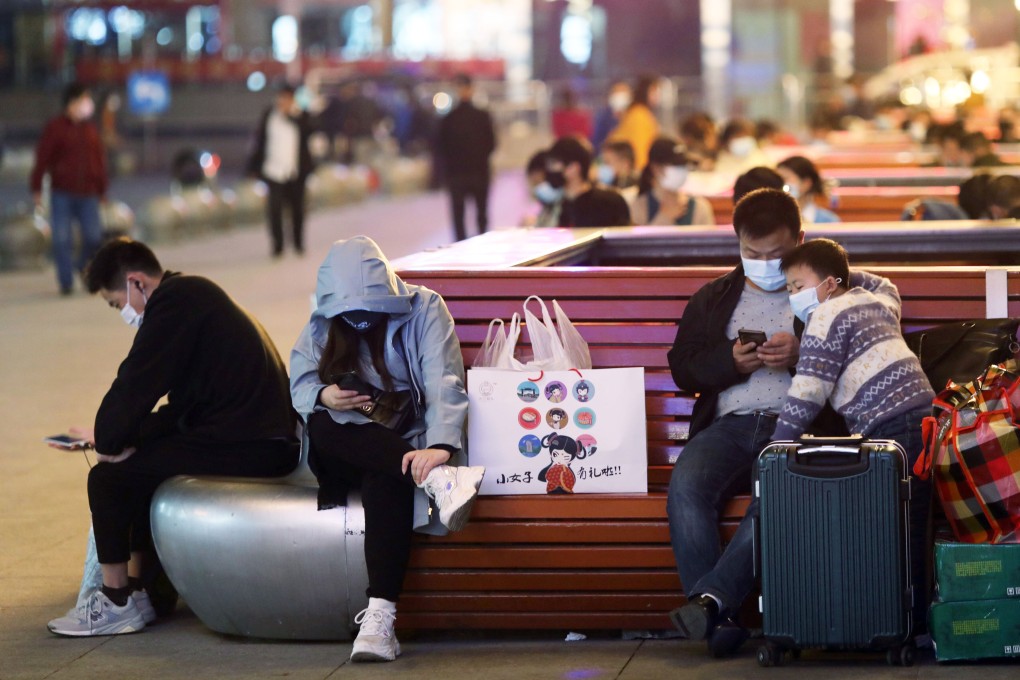 Passengers started gathering at Wuhan’s main station on Tuesday before restrictions on leaving the city were lifted at midnight. Photo: Simon Song