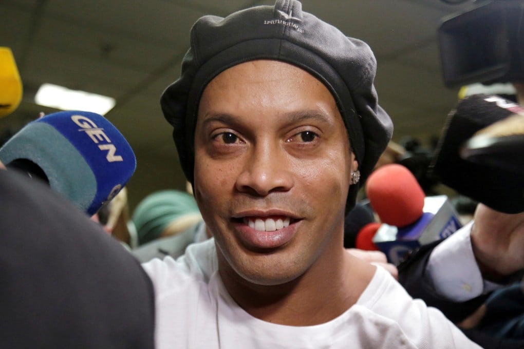 Former Brazil and Barcelona footballer Ronaldinho leaves Paraguay's Supreme Court after testifying. Photo: Reuters