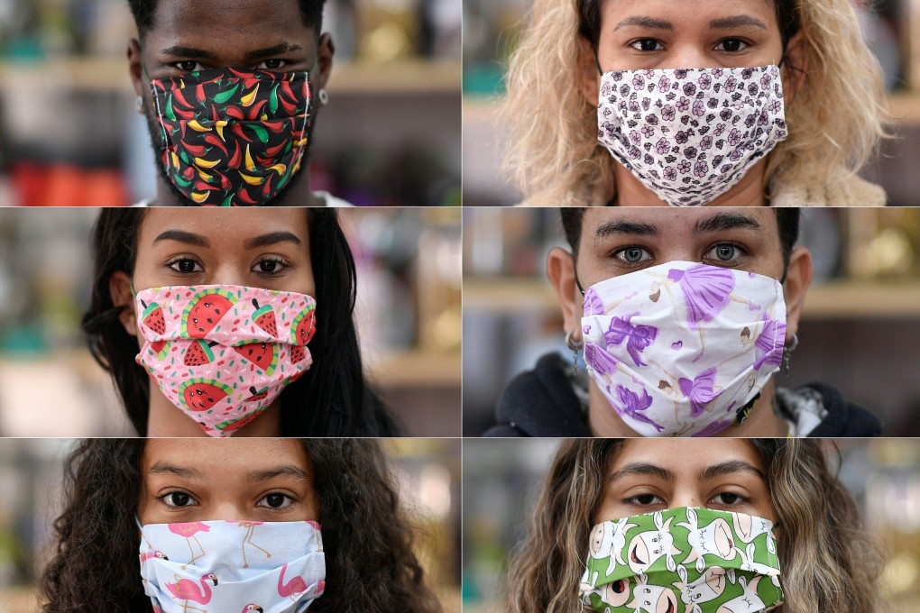 People wear protective masks made by seamstresses of the Vila Novo Sao Lucas favela, in Belo Horizonte, Brazil. Photo: AFP