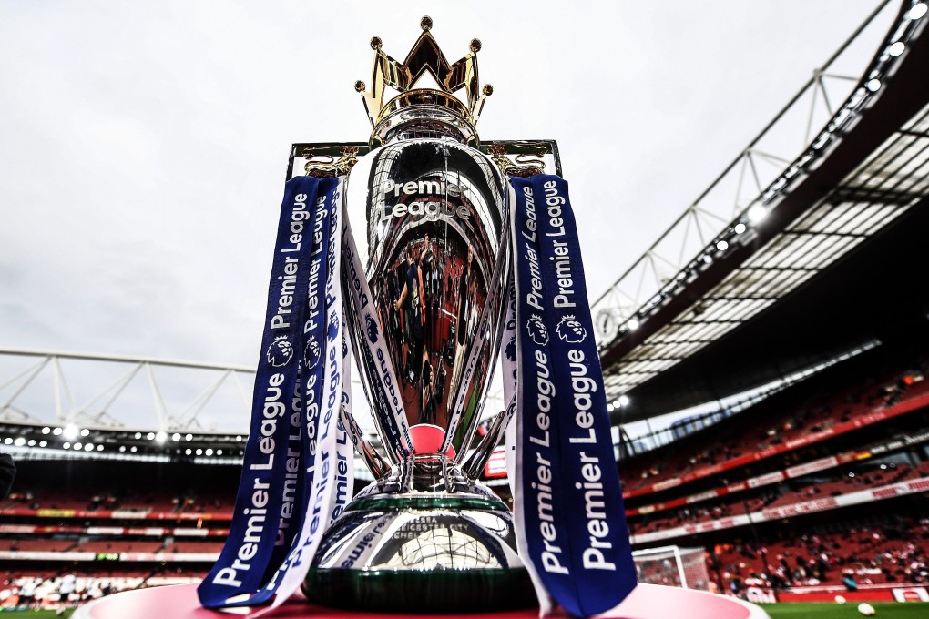The English Premier League trophy in an empty Emirates Stadium. Media report that season may finish without fans. Photo: EPA
