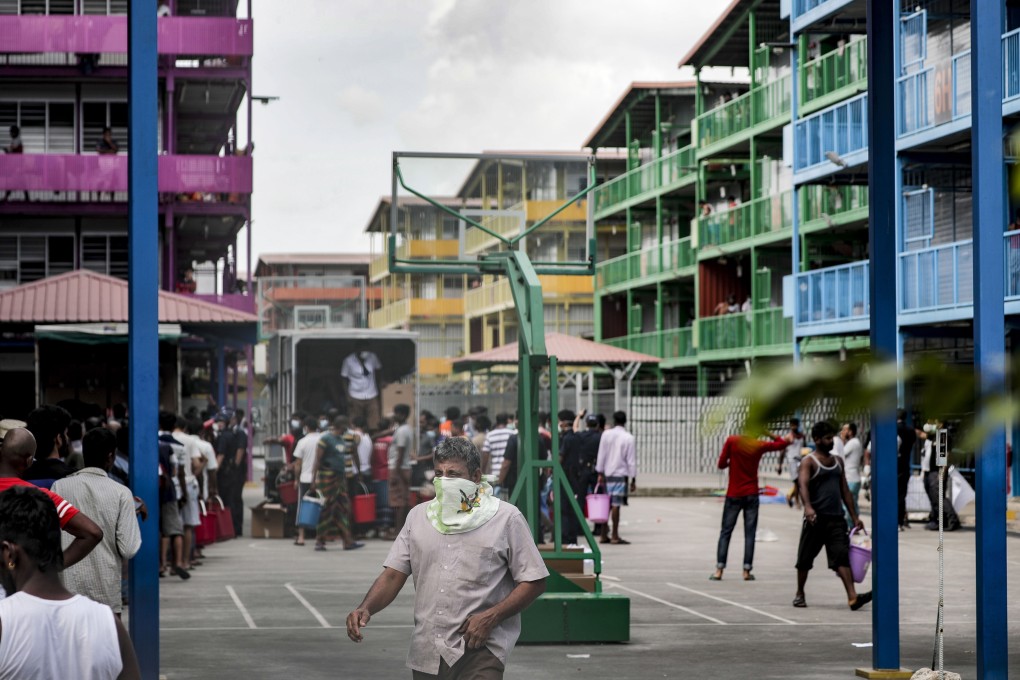 Foreign workers pictured inside one of the dormitories Singapore put under virus lockdown at the weekend. Photo: EPA