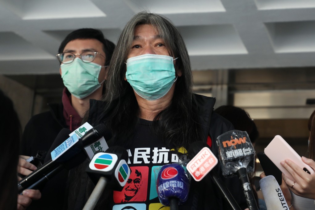 Hong Kong activists Avery Ng Man-yuen and Leung Kwok-hung speak to the press at the High Court in Admiralty for the mask law appeal case. Photo: Xiaomei Chen