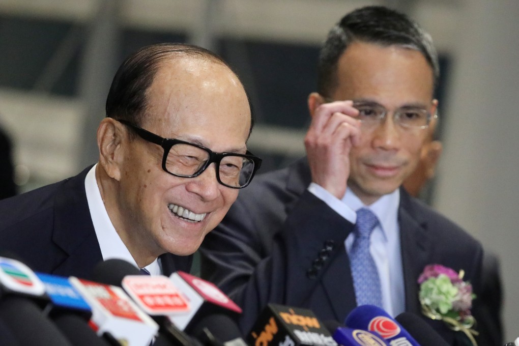 Tycoon Li Ka-shing with his son Victor Li Tzar-kuoi, chairman of CK Asset Holdings Ltd, at the companies annual dinner in Wan Chai, Hong Kong in January 2020. Photo: Dickson Lee