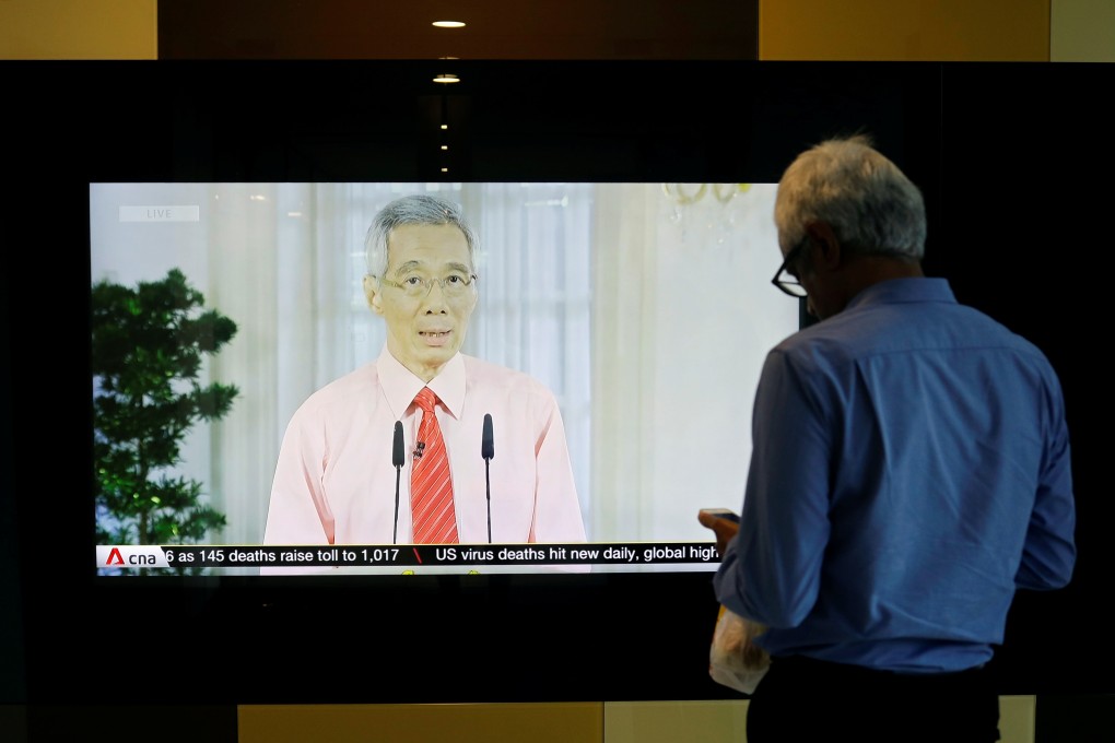 Singapore’s prime minister, Lee Hsien Loong, addresses the nation on the coronavirus in a telecast. Photo: Reuters
