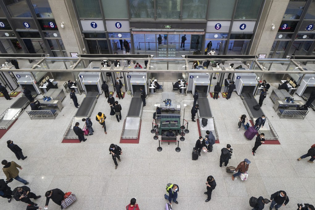 Passengers enter Wuchang Railway Station in Wuhan. Photo: Xinhua