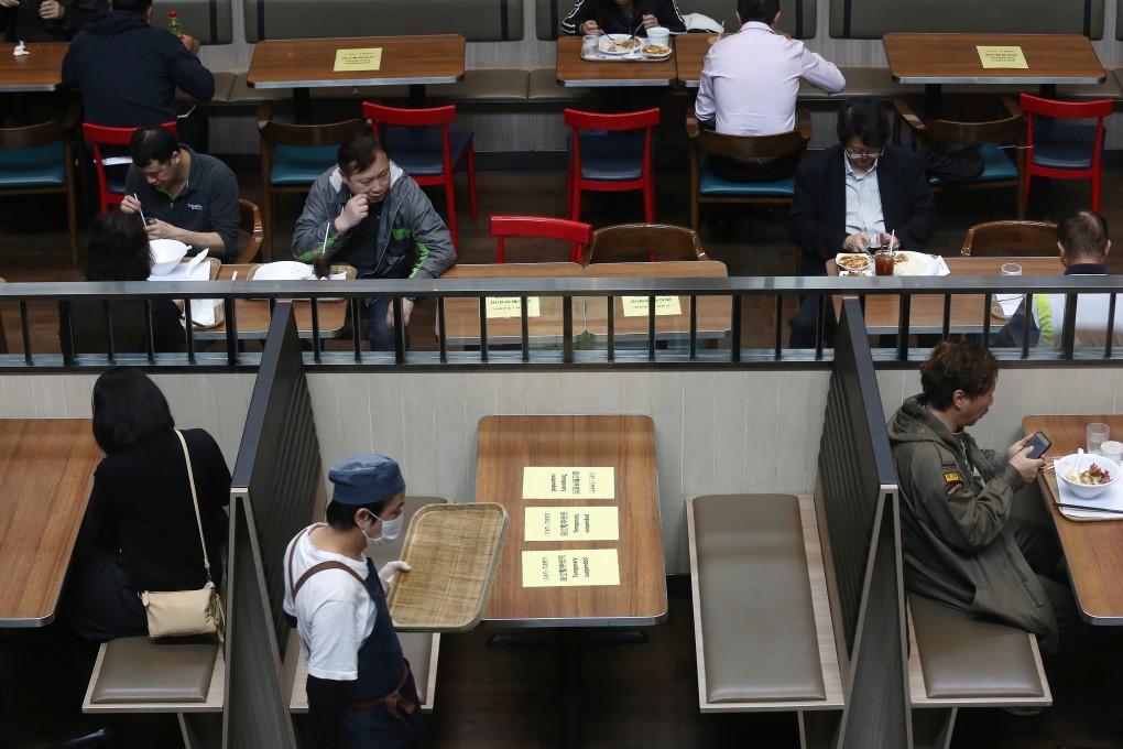 Social-distancing measures in place among diners. Photo: Jonathan Wong