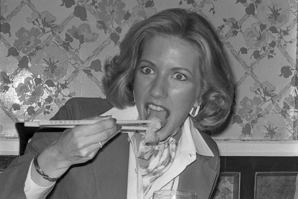 American visitor Ellen Clark enjoys dim sum in a local Hong Kong restaurant. Photo: SCMP