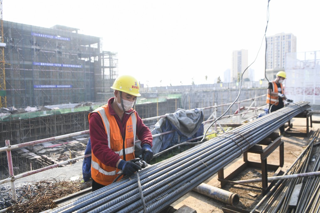 Construction sites, like this one in Chongqing in southwestern China, are busy again as works resume under easing lockdown measures amid the viral outbreak. Photo: Xinhua