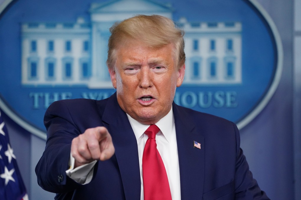 US President Donald Trump points at a reporter as he talks about the Department of Health and Human Services inspector general’s report on the shortage of novel coronavirus tests for hospitals during the daily coronavirus task force briefing at the White House in Washington on April 6. Photo: Reuters