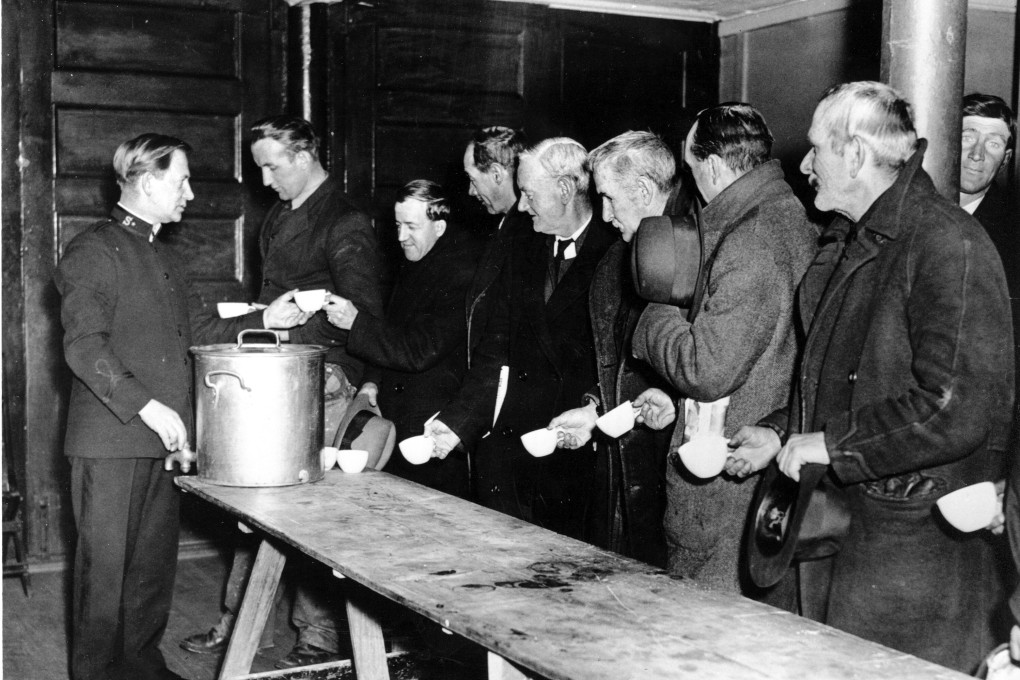 A Salvation Army relief worker tends to a line at a soup kitchen in the US during the Great Depression. The IMF has warned that Covid-19 will cause ‘the worst economic fallout since the Great Depression’. Photo: AP