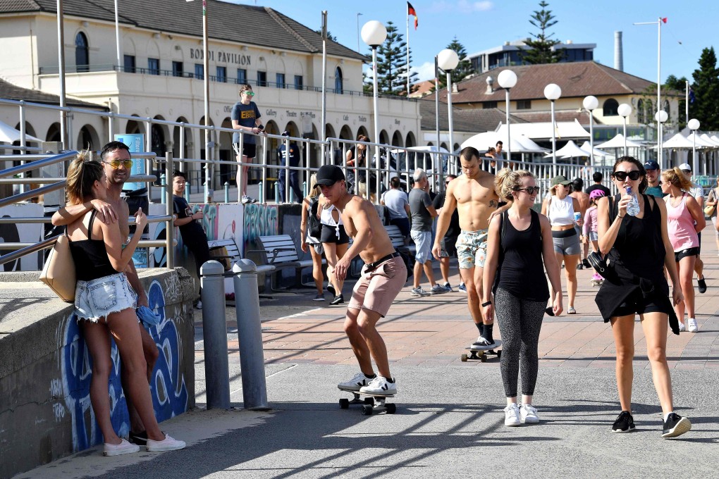 People pictured in the Bondi Beach area of Sydney on Saturday. Photo: AFP