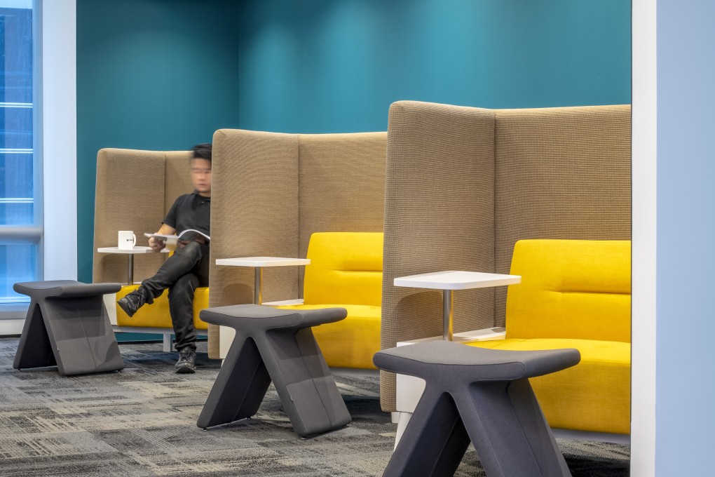 Photo of a project of One Space, where a one-person shielded pod-type furniture is used in a social hub. Designers are figuring out ways to better shield workers from spreading illnesses in the workplace. Photo: Handout