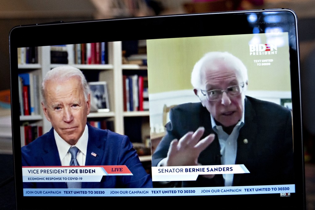 US Senator Bernie Sanders (right) speaks as former vice-president Joe Biden listens during a virtual event seen on an Apple laptop on Monday. Photo: Bloomberg