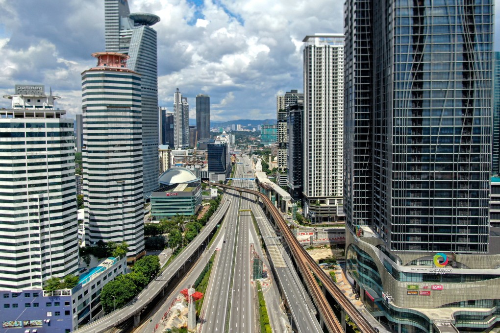 The normally crowded streets of Kuala Lumpur are empty during the national lockdown, but cases of domestic violence are increasing behind closed doors. Photo: DPA