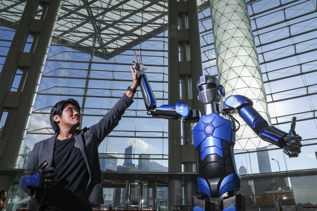 Mark Mak, founder of Roborn Dynamics, with the company’s robot ME1 during the Trade Development Council’s Entrepreneur Day at the Convention and Exhibition Centre in Wan Chai in May 2018. Roborn has recently focused on designing and producing a robot that measures body temperatures. Photo: K. Y. Cheng
