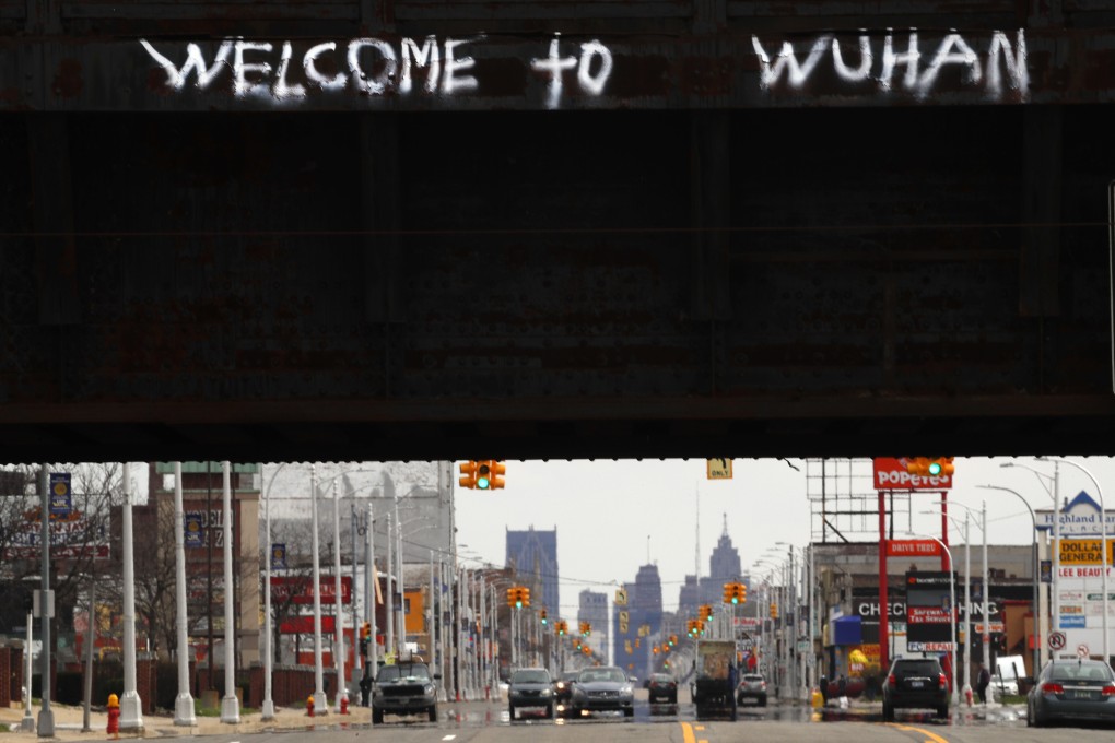 ‘Welcome to Wuhan’ is spray-painted on a bridge in Highland Park, Michigan. Photo: AP