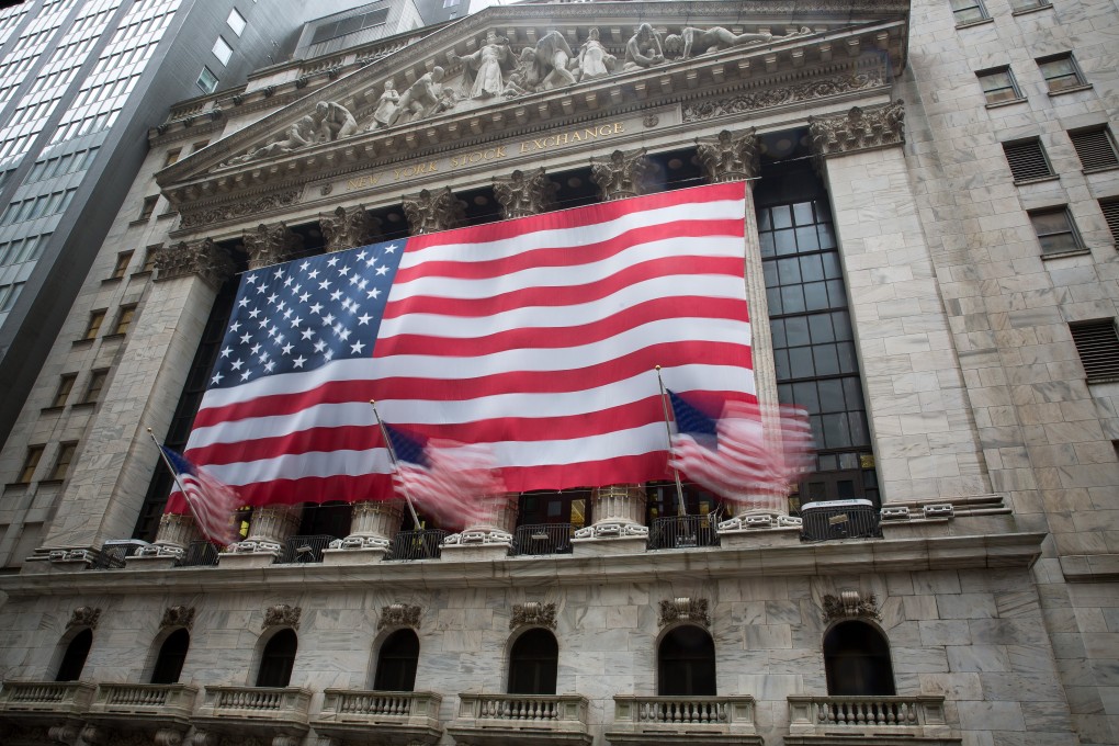 US national flags flutter outside the New York Stock Exchange. The US has the world’s largest stock market with a capitalisation of US$29 trillion. Photo: Xinhua