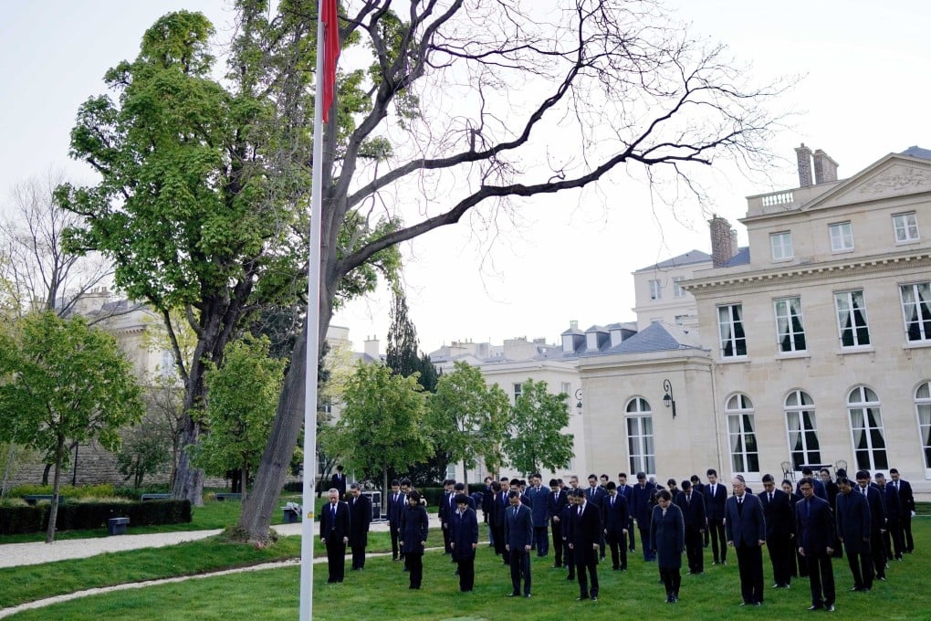 The Chinese national flag flies at half-mast at the Chinese embassy in Paris on April 4 to mourn those who died of Covid-19. Photo: Xinhua