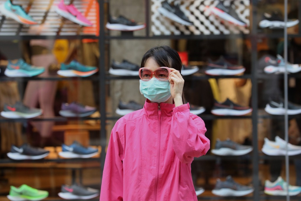 A woman wearing a face mask, Mong Kok, during Hong Kong’s period of social distancing. Photo: Dickson Lee