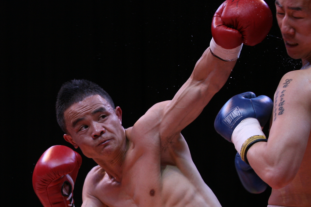 Xiong Chaozhong lands a punch during a WBC Asian Championship bout. Photos: Handout