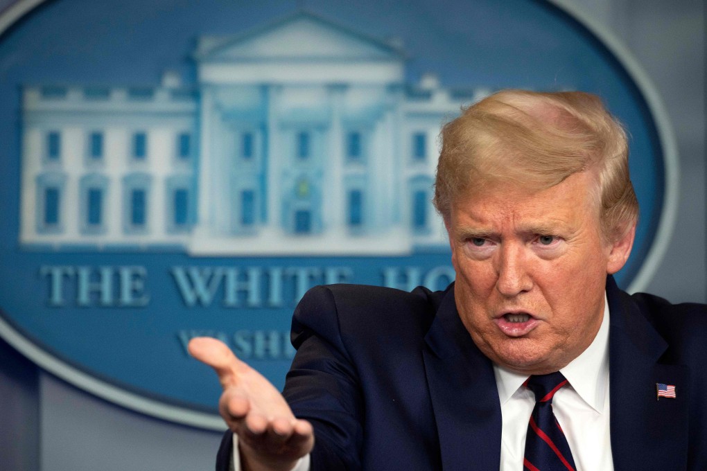 US President Donald Trump speaks during a daily coronavirus briefing at the White House in March. Photo: AFP