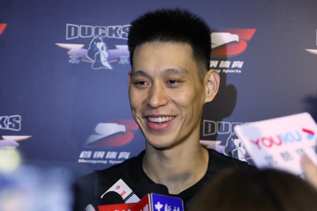 Jeremy Lin speaks to the media after signing for the Beijing Ducks in the Chinese Basketball Association. Photo: Simon Song