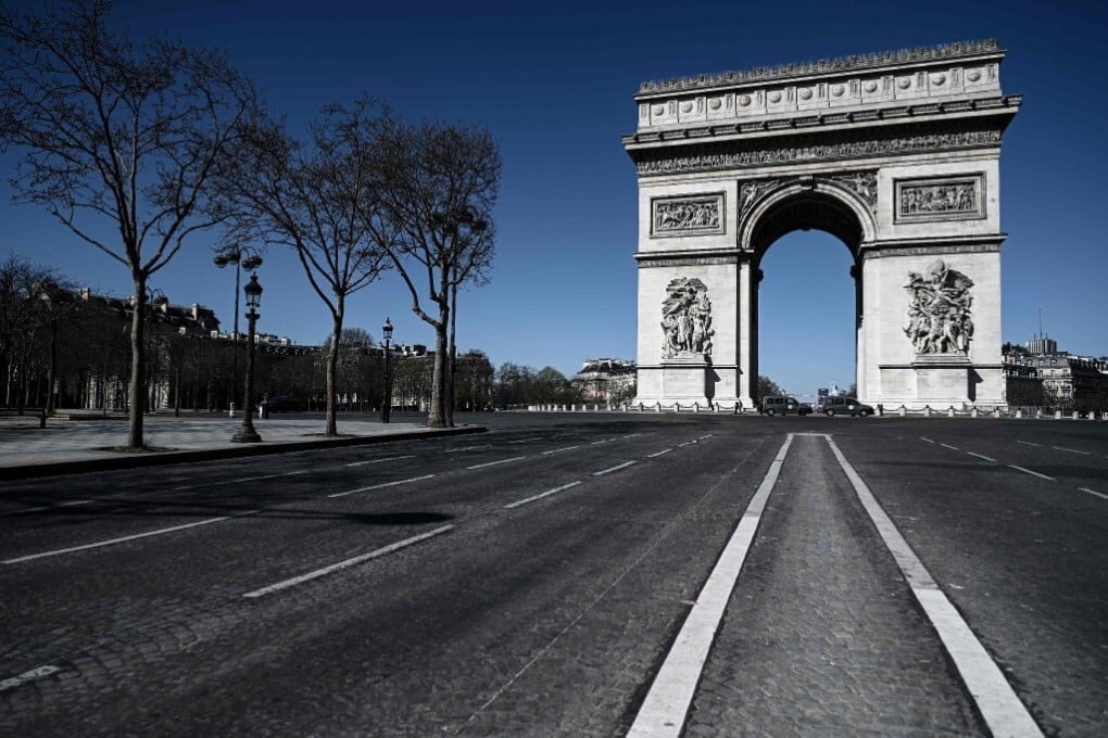An empty street leading to the Arc de Triomphe, in Paris, France, on March 23. Photo: AFP