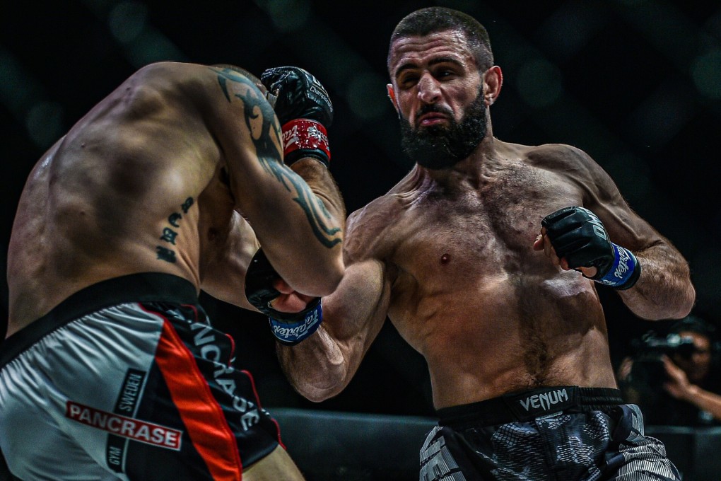 Kiamrian Abbasov throws an uppercut at Zebaztian Kadestam. Photos: One Championship